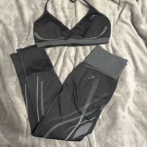 Analis Cruz Gymshark Black and Gray Leggings and Sports Bra Set